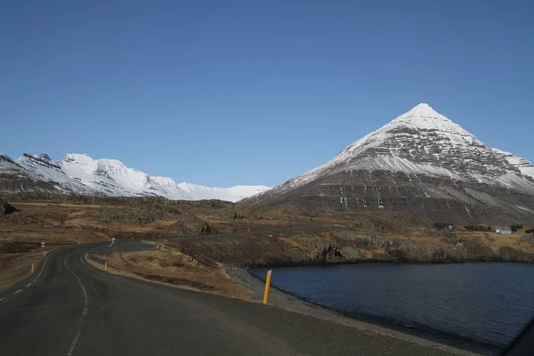 Road in Iceland. Landscape and road in winter, road trip on the country at Iceland. Beautifull nature of Iceland. Epic and majestic landsacapes. Route Number One (Ring Road)