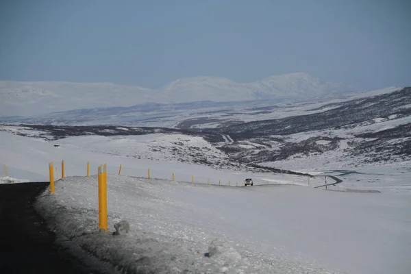 Road in Iceland. Landscape and road in winter, road trip on the country at Iceland. Beautifull nature of Iceland. Epic and majestic landsacapes. Route Number One (Ring Road).