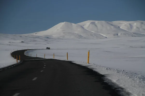 Road in Iceland. Landscape and road in winter, road trip on the country at Iceland. Beautifull nature of Iceland. Epic and majestic landsacapes. Route Number One (Ring Road).