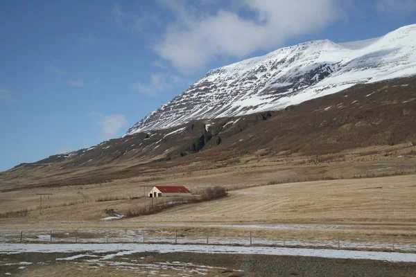 Road in Iceland. Landscape and road in winter, road trip on the country at Iceland. Beautifull nature of Iceland. Epic and majestic landsacapes. Route Number One (Ring Road).