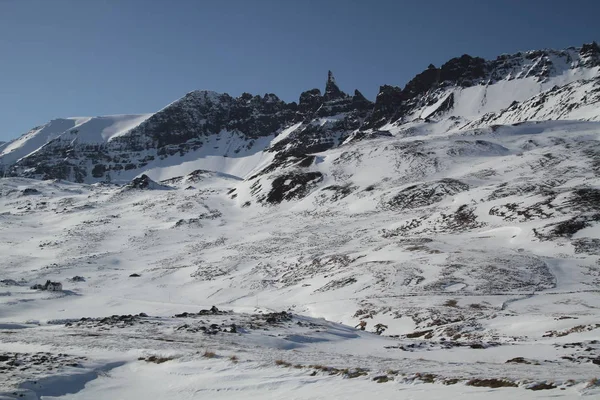 Beautifull winter landscapes of Iceland. Mountain rivers and wonderful icelandic nature. Rocky land, high mountains, dramatic sky. Epic and majestic landscapes and nature of Iceland.