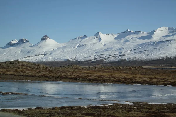 Epic landscapes of Iceland. Sea bays, waterscapes, mountain rivers and wonderful icelandic nature. Rocky land, high mountains. Beautifull nature of Iceland. Epic and majestic landsacapes.