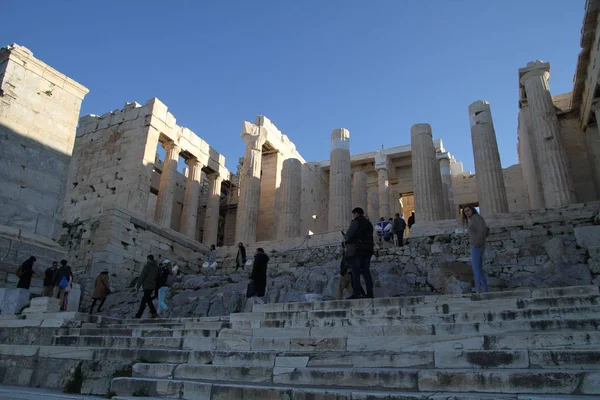 Acropolis of Athens, Greece, with the Parthenon Temple. Famous old Parthenon temple is the main landmark of Athens. View of Odeon of Herodes Atticus, Figures of the Caryatid Porch of the Erechtheion.