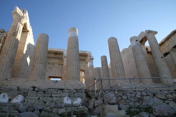 Acropolis of Athens, Greece, with the Parthenon Temple. Famous old Parthenon temple is the main landmark of Athens. View of Odeon of Herodes Atticus, Figures of the Caryatid Porch of the Erechtheion.