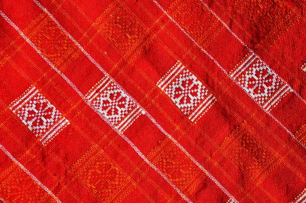 Red fabric with a pattern — Stock Photo, Image
