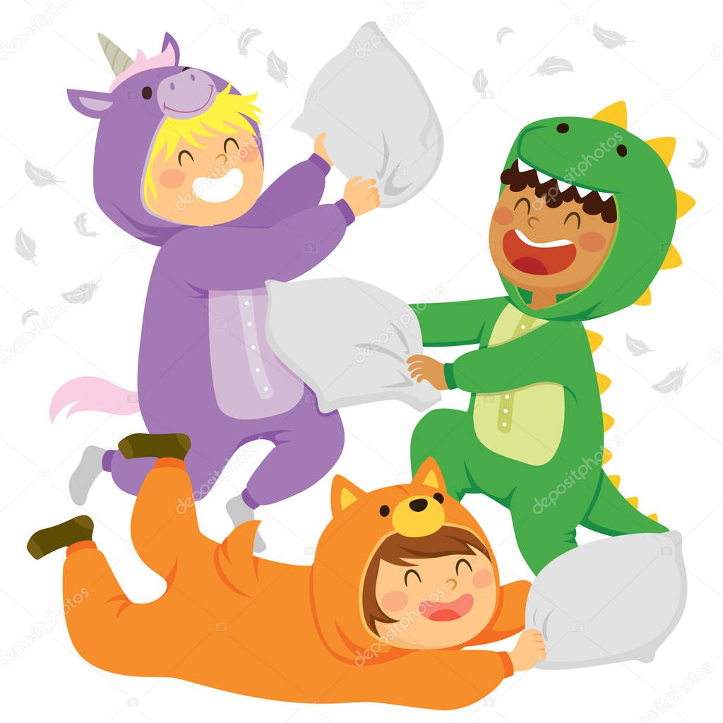 Three kids having a pillow fight while wearing animal onesie jumpsuits in a slumber party.