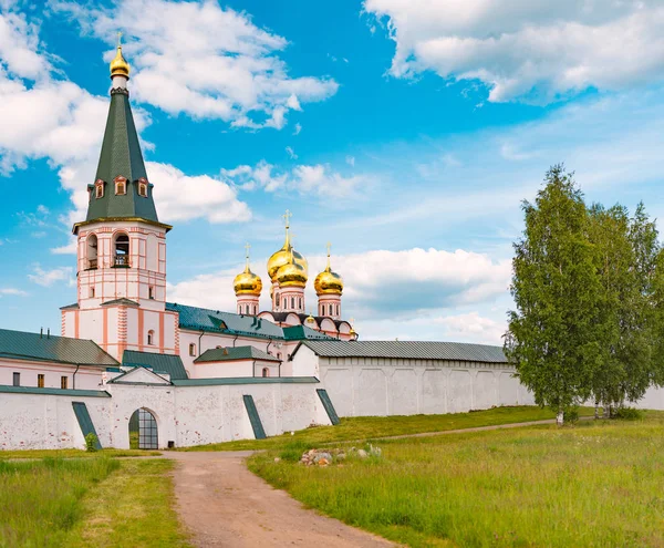 Monastery with bell tower and church domes — Stock Photo, Image