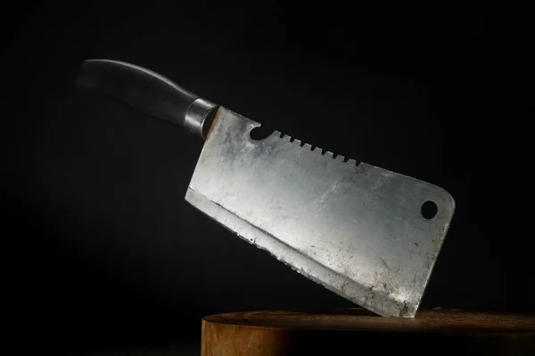 Old Cleaver Stuck Wooden Cutting Board Dark Background — Stock Photo, Image