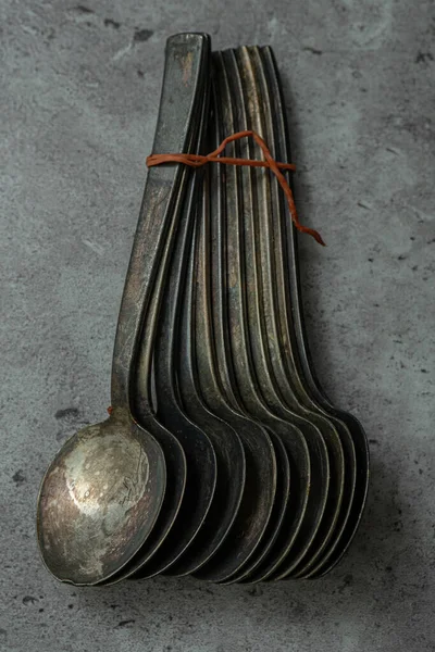 Old Rustic Tea Spoon Tied Together Gray Background — Stock Photo, Image