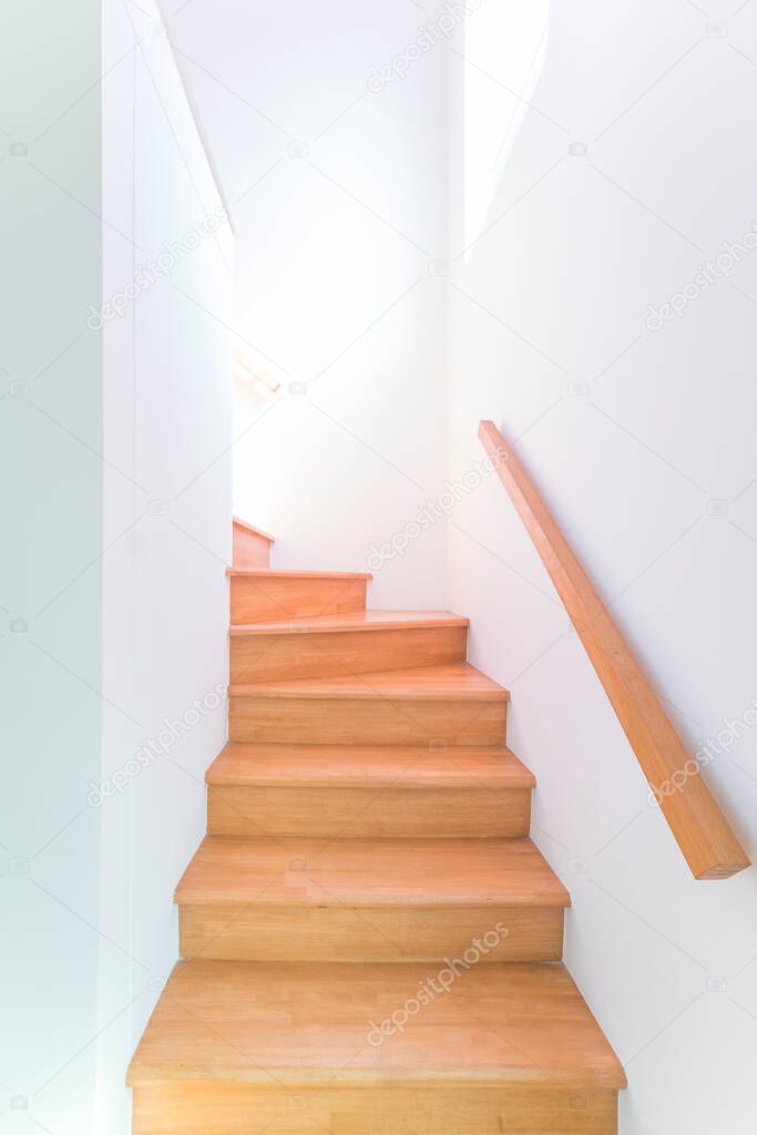 Wooden stair in white stairway, minimal style