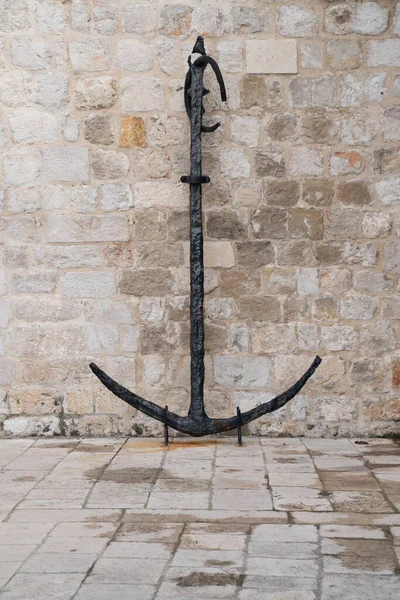 Rusty Steel Anchor Leaning Again Sandstone Wall Dubrovnik Croatia — Stock Photo, Image