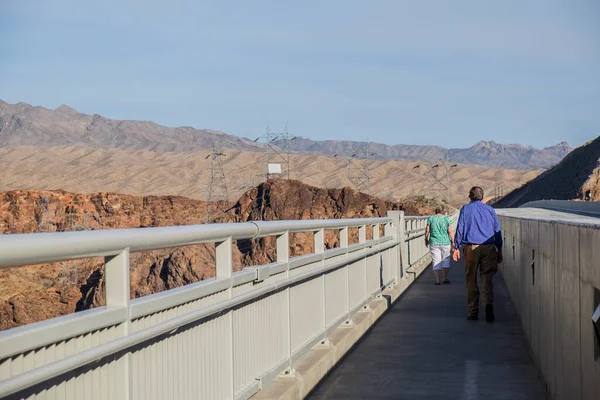 Elders walking across the bridge at Hoover Dam