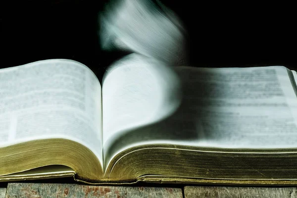 Bible Pages Motion Blurry Flipping Still Life Art Slow Shutter — Stock Photo, Image