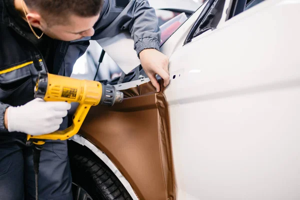 Car Wrapping Specialist Putting Vinyl Foil Film Car Selective Focus — Stock Photo, Image