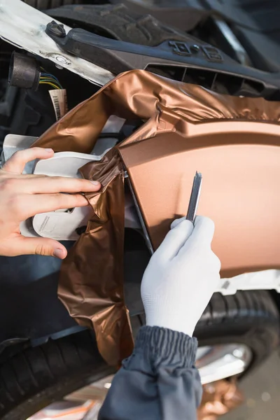 Car Wrapping Specialist Putting Vinyl Foil Film Car Selective Focus — Stock Photo, Image