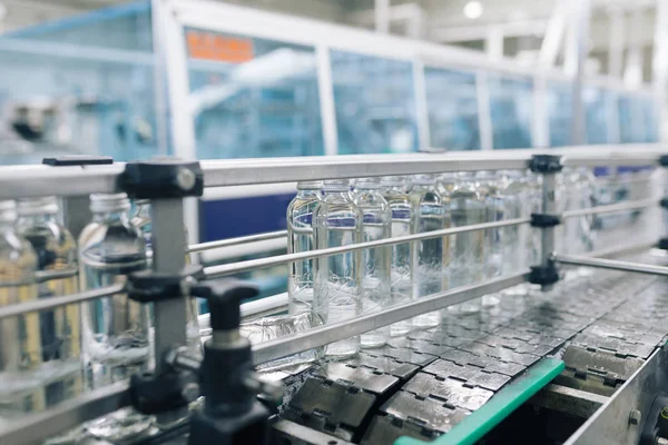 Bottling plant - Water bottling processing . Selective focus.
