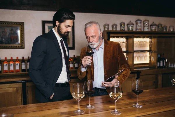 Winemakers Wine Cellar Holding Glass Wine Checking Sommeliers Testing Wines — ストック写真