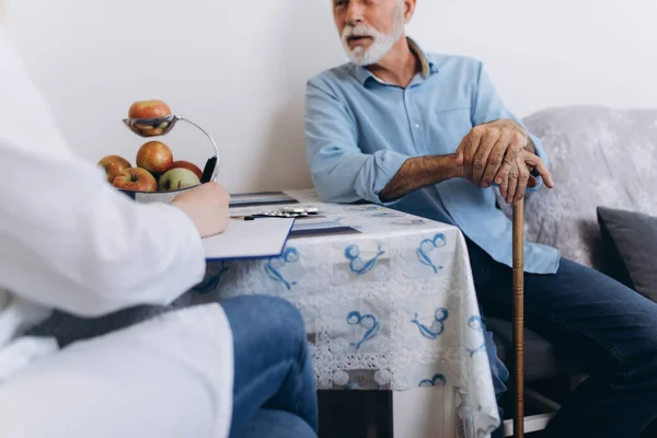 Young Positive Caregiver Taking Care Senior Man Nursing Home — Stock Photo, Image