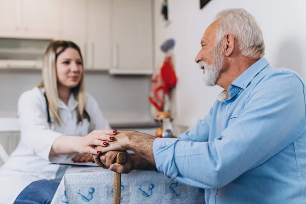 Young Positive Caregiver Taking Care Senior Man Nursing Home — Stock Photo, Image