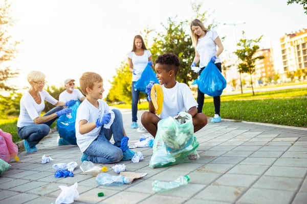 Volunteers Garbage Bags Cleaning Garbage Outdoors Ecology Concept — стоковое фото