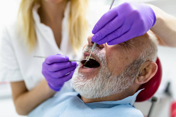 Dentist Examining Patient Dental Clinic Stock Photo