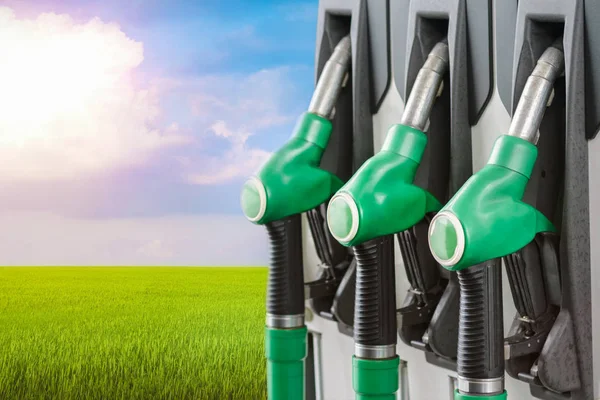 Number Fuel Dispensers Filling Column Background Green Field Biodiesel Biofuel — Stock Photo, Image