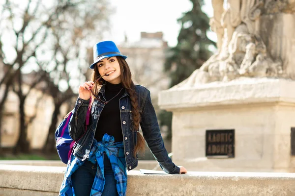 Young stylish woman in blue hat, walking on the old town street. Ukraine, Lviv — 스톡 사진