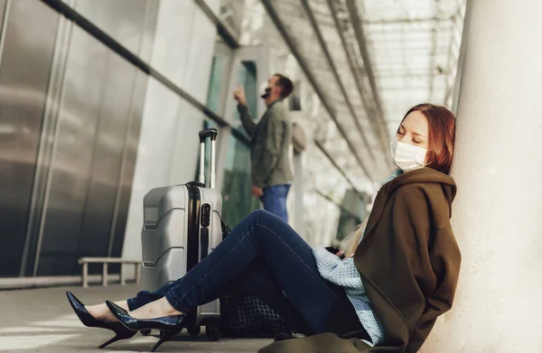 Young Woman Medical Mask Sits Luggage Airport Tortured Flight Woman — Stok Foto