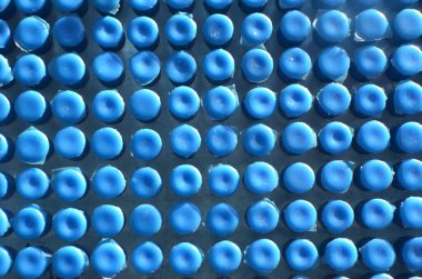 Mavi plastik düğme arka plan / doku. Doku mozaik. Derma kuvvetler. Arka plan