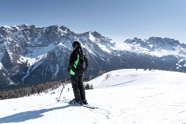 Man Stands Side Mountain Backdrop Snow Capped Dolomites Concept Sports — Stock Photo, Image