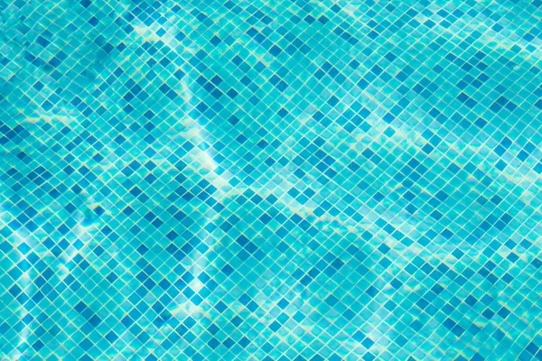 Helder blauw oppervlak zwembad water achtergrond — Stockfoto