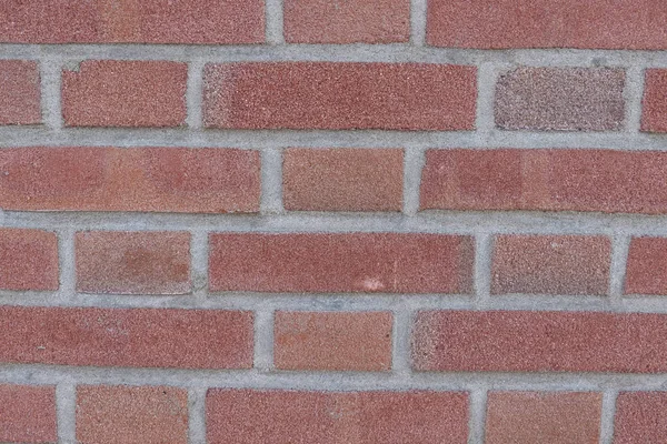 背景またはテクスチャとして使用可能な赤レンガの壁 — ストック写真