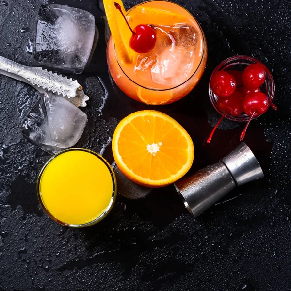 Tequila Sunrise Cocktail Orange Ice Cubes Maraschino Cherries Ice Tongs — Stock Photo, Image