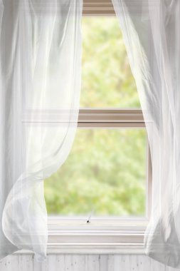 Open window with voile curtains blowing in the breeze clipart