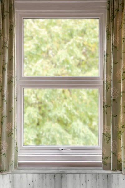 Window with open curtains