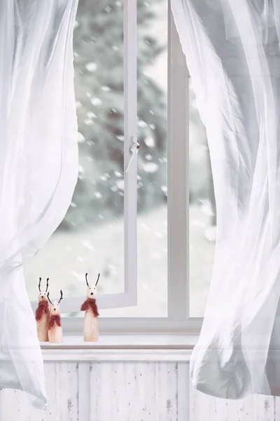Wooden Reindeers Sitting Winter Window — Stock Photo, Image