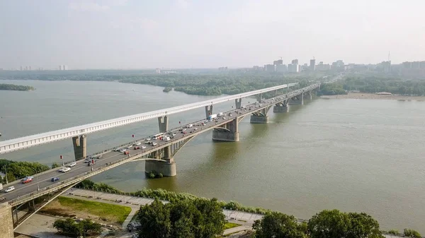 Metro Bridge and Communal Bridge. Panorama of the city of Novosibirsk. View on the river Ob. Russia, From Dron — Stock Image Metro Bridge Communal Bridge Panorama City Novosibirsk View River Russia Stock Picture