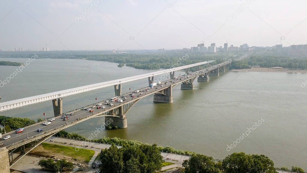 Metro Bridge and Communal Bridge. Panorama of the city of Novosibirsk. View on the river Ob. Russia, From Dron  