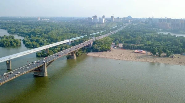 Metro Bridge and Communal Bridge. Panorama of the city of Novosibirsk. View on the river Ob. Russia, From Dron — Stock Image Metro Bridge Communal Bridge Panorama City Novosibirsk View River Russia Royalty Free Stock Photos