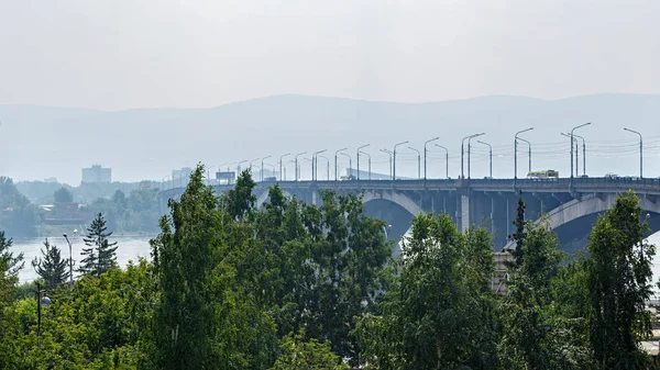 Bridge over the river Yenisei in the city of Krasnoyarsk - Communal bridge. Russia