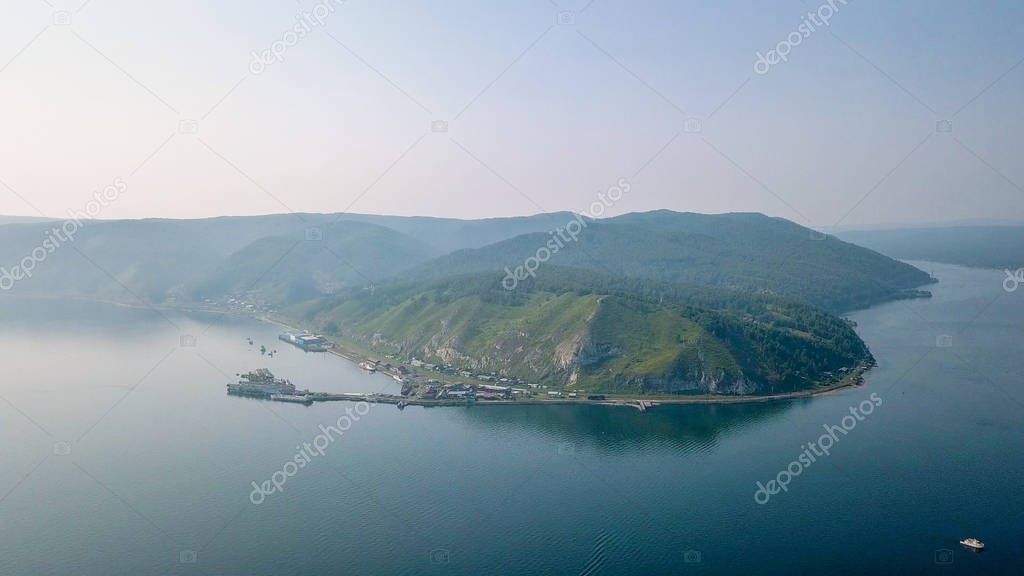 Russia, Irkutsk. Port Baikal, Cape Ustyansky. Source of the Angara River from Lake Baikal, From Dron  