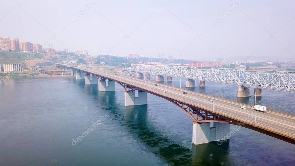 Russia, Krasnoyarsk. The bridge across the Yenisei.  AUTO-ROAD, From Dron  