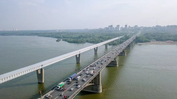 Metro Bridge and Communal Bridge. Panorama of the city of Novosibirsk. View on the river Ob. Russia, From Dron — Stock Image Metro Bridge Communal Bridge Panorama City Novosibirsk View River Russia Royalty Free Stock Photos