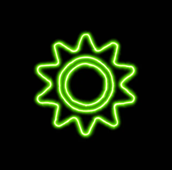 Zelený neonové symbol slunce — Stock fotografie