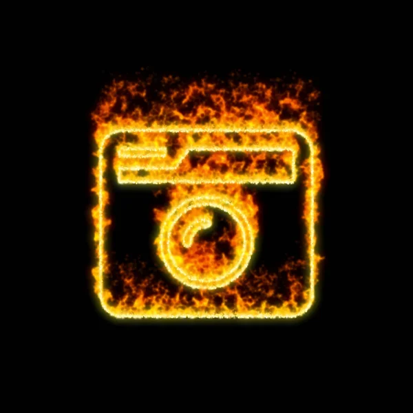 The symbol camera retro burns in red fire