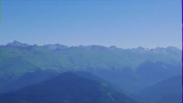 Glitch effect. Mountains in the blue haze. Rosa Khutor. Sochi, Russia. 4K — Stock Video