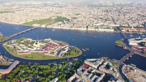 Saint-Petersburg, Russia. Neva River. Panoramic aerial view of Hare Island and Artelery Island. Peter-Pavel s Fortress. Trinity bridge. Spit of Vasilyevsky Island. 4K — Stock Video