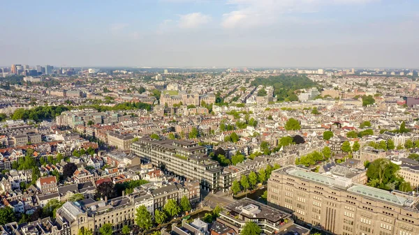 Amsterdam, Netherlands. Museum ( Rijksmuseum ). The building of the XIX century. Flying over the rooftops of the city, Aerial View — Stock Photo, Image