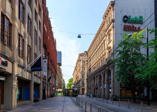 Helsinki, Finland - June 21, 2019: Street with a tram in the cit — Stock Photo, Image