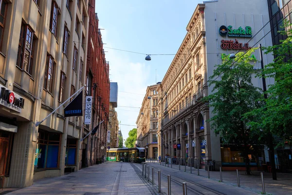 Helsinki, Finland - June 21, 2019: Street with a tram in the cit — Stock Photo, Image